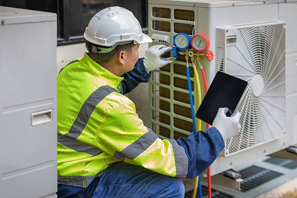 Professional Hvac technician working in League City, TX